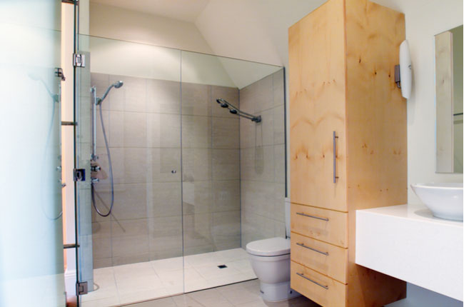 What type of glass is used for glass shower doors?